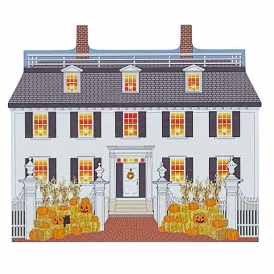 A miniature replica of the Ropes Mansion from the Hocus Pocus movie, featuring the house with pumpkin decorations in front.
