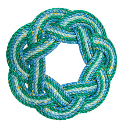 A Sailor's Wreath in varying shades of blue and green made from lobster rope