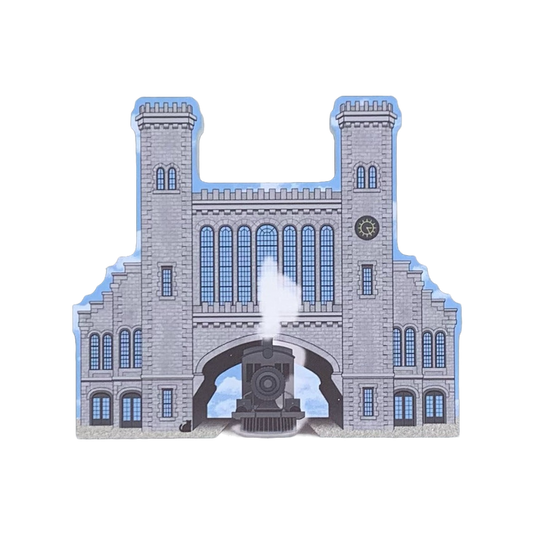 A decorative block featuring a train station, a historic building that once stood in Salem, Massachusetts.