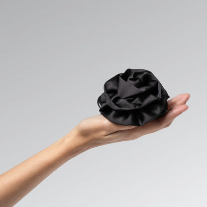 KITSCH Satin Rosette Flat Cloud Clip Black Medium — model hair shot 2