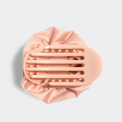 Terracotta flat clip on a light gray background