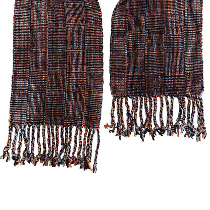 Woven fabric scarf with fringes on a white background