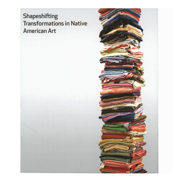 Cover of the book 'Shapeshifting: Transformations in Native American Art' featuring a photograph of a textile artwork with multiple layers of folded and draped fabrics.