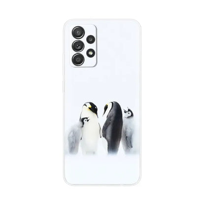 a white phone case with a penguin and penguin penguins
