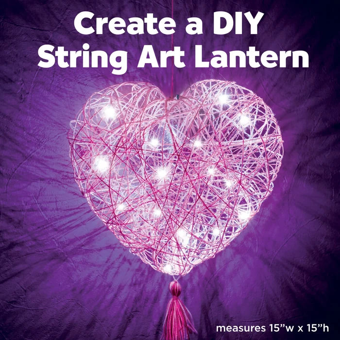 Heart-shaped string art lantern with lights on a purple background, text 'Create a DIY String Art Lantern' and dimensions.