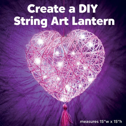 Heart-shaped string art lantern with lights on a purple background, text 'Create a DIY String Art Lantern' and dimensions.