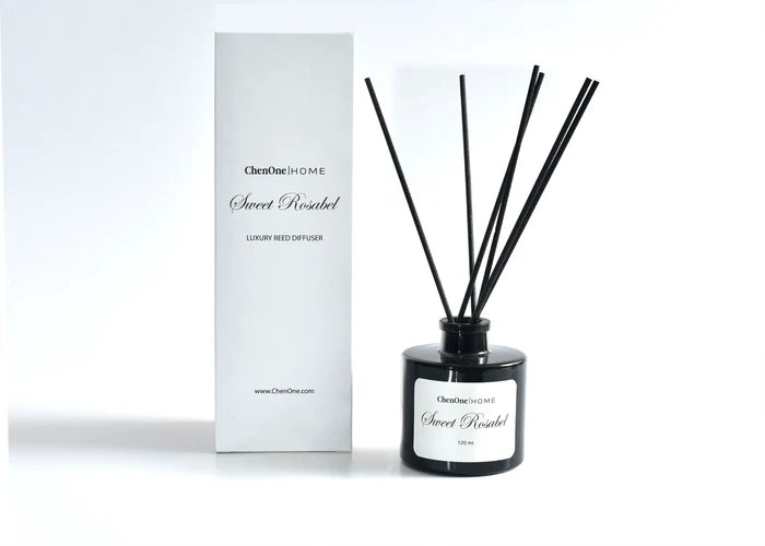 Sweet Rosabel reed diffuser set: black glass bottle with 4 reeds, box included.