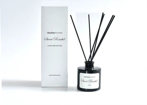 Sweet Rosabel reed diffuser set: black glass bottle with 4 reeds, box included.