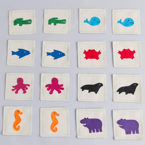 Set of square cards with colorful animal illustrations on a gray background