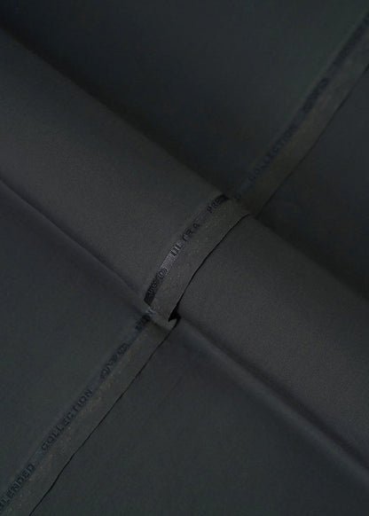 Black fabric with stitched seam and printed label on the edge