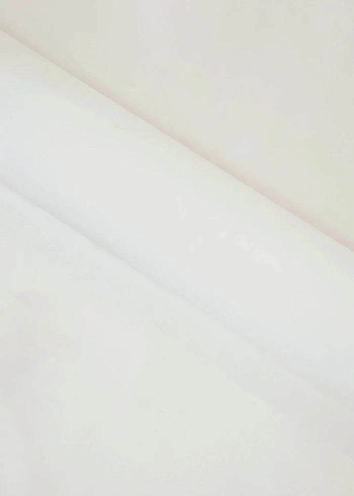 Cream wash-and-wear fabric, smooth close-up