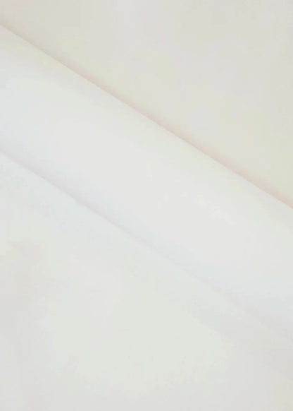 Cream wash-and-wear fabric, smooth close-up