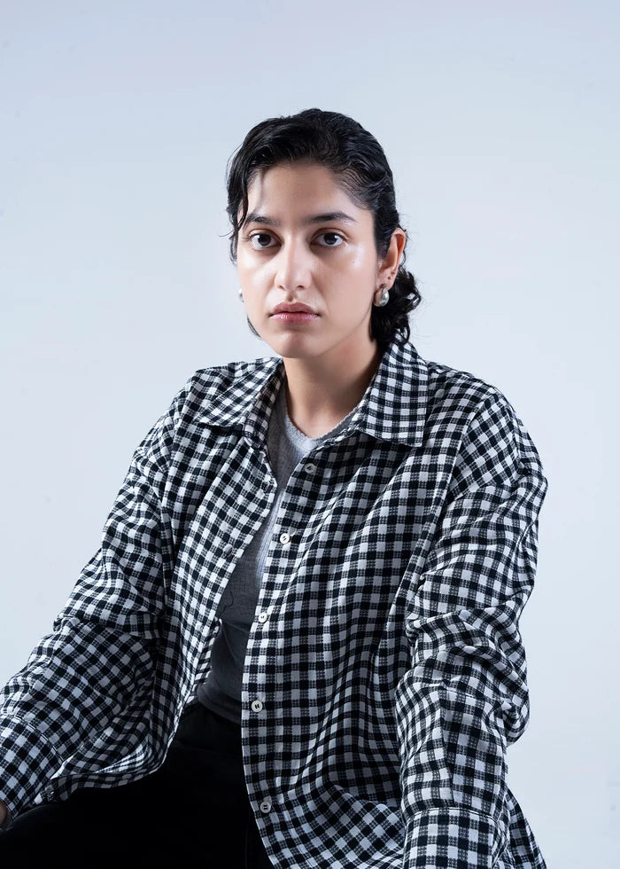Women’s winter woven top in black-and-white check, collared button-up front