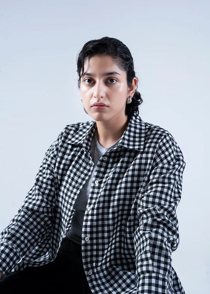 Women’s winter woven top in black-and-white check, collared button-up front