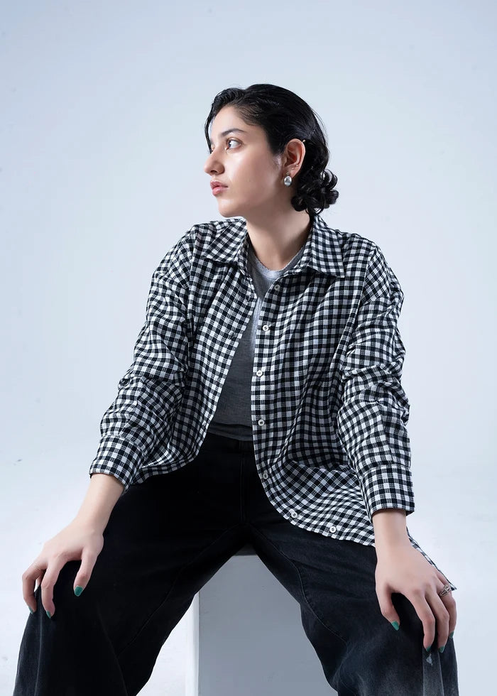 Women’s winter woven top in black-and-white check with rolled 3/4 sleeves