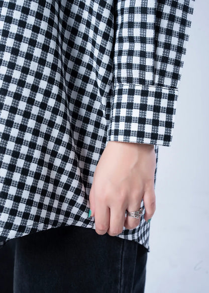 Women’s winter woven top sleeve cuff in black-and-white check, with button detail