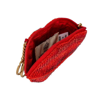 Red beaded coin purse key chain with gold chain on a white background